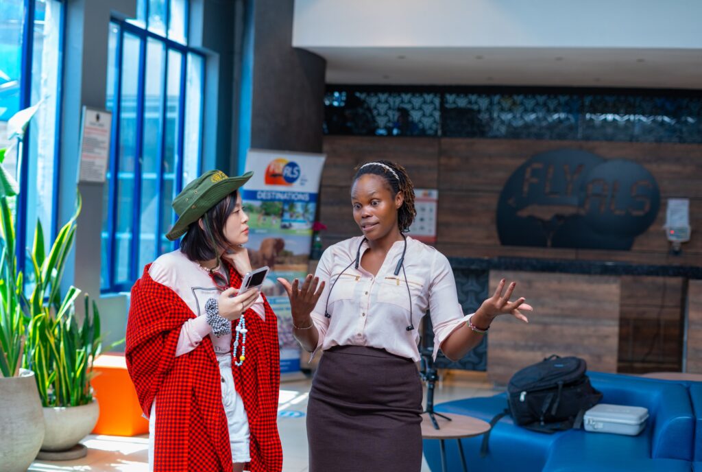 Personal operator briefing at Wilson Airport for a guest starting a solo female safari Kenya