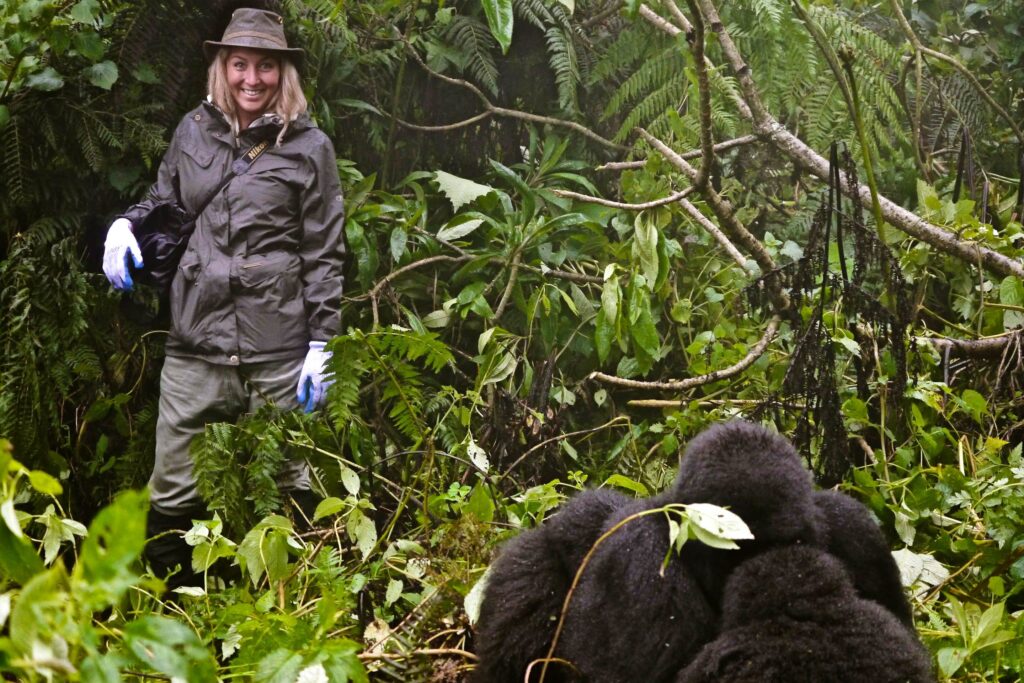 Trekkers traversing dense forest trails during a Bwindi gorilla permit safari excursion