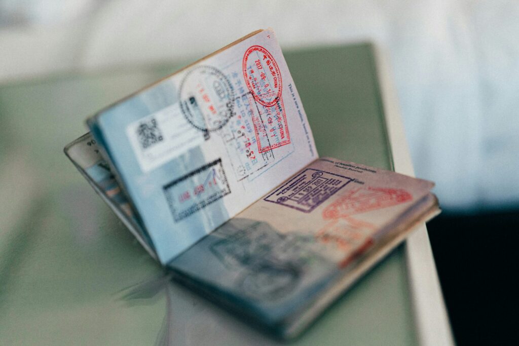 Travel insurance certificate and passport on a table at a safari camp in Kenya, essential for Kenya safari travel insurance